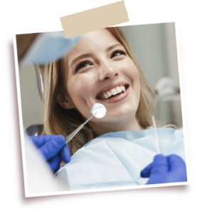 a woman smiling at the dentist