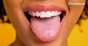 a close-up of a woman's mouth with her tongue sticking out